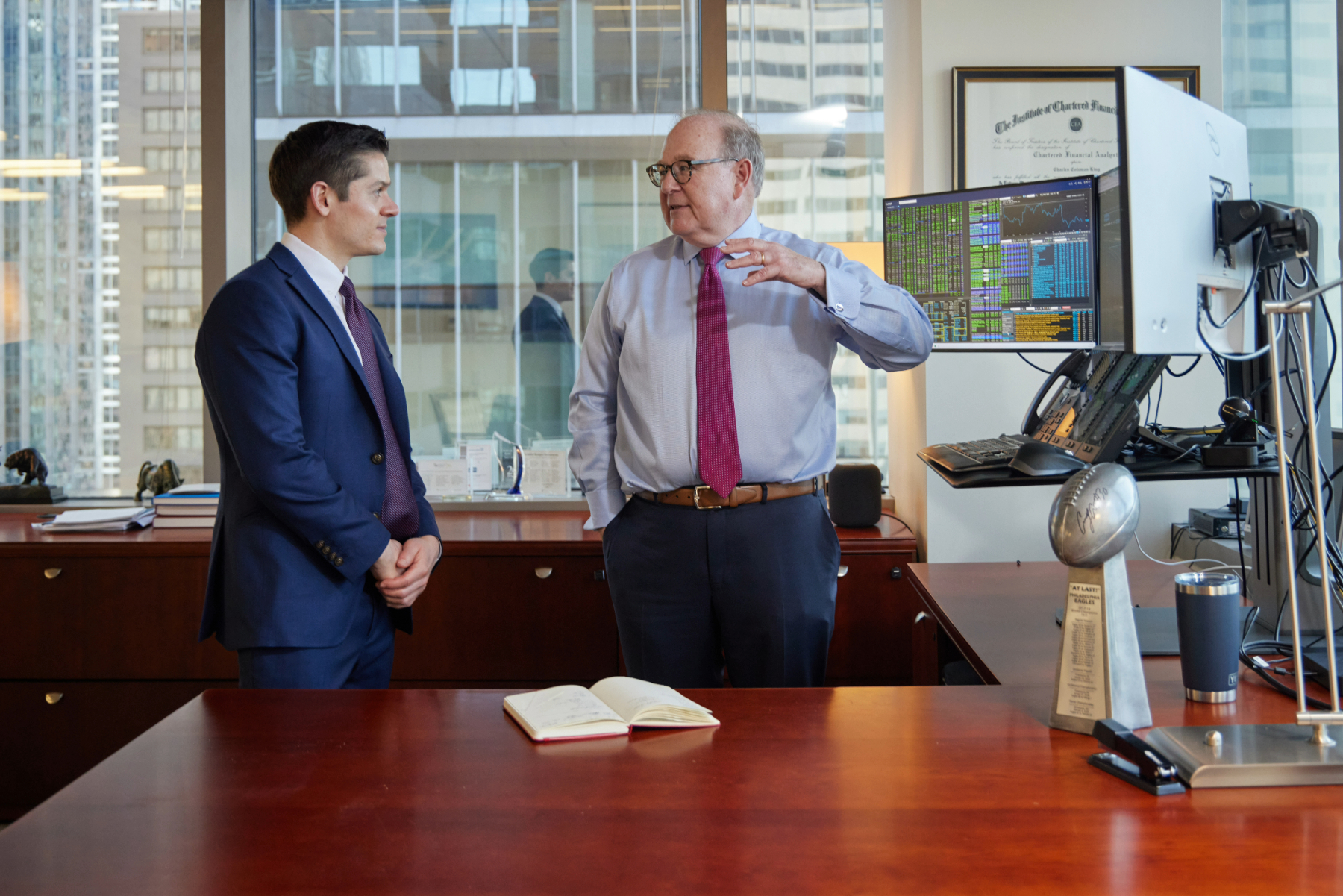 candid photo of 1919 employees at a standing desk